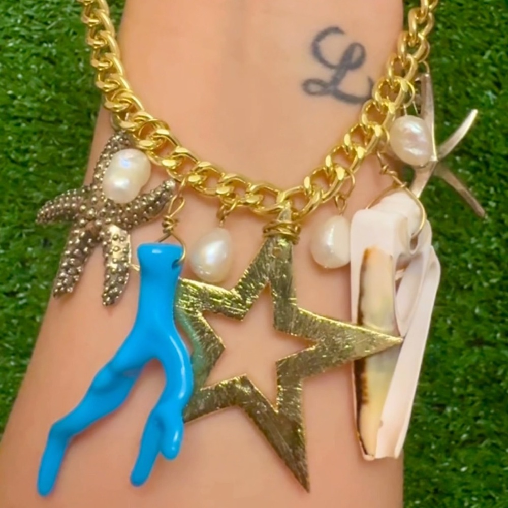 Exclusive handmade ss necklace w/mother pearl, seashell & starfish charms.new